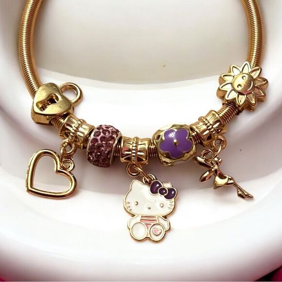 Hello Kitty Lavender Heart Lock Sunflower Fairy Gold Tone Stretch Charm Bracelet - Picture 2 of 2